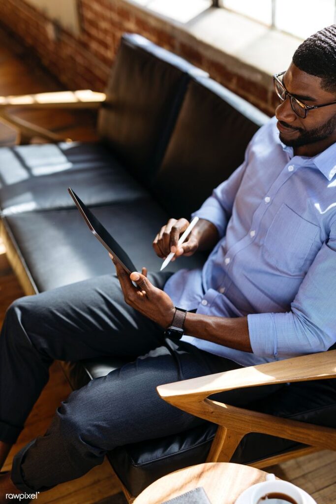 black man using tablet